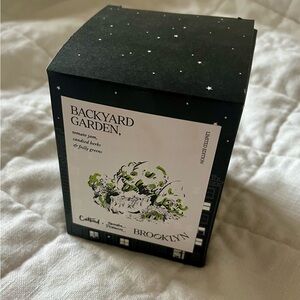 Catbird candle. Backyard garden scent.